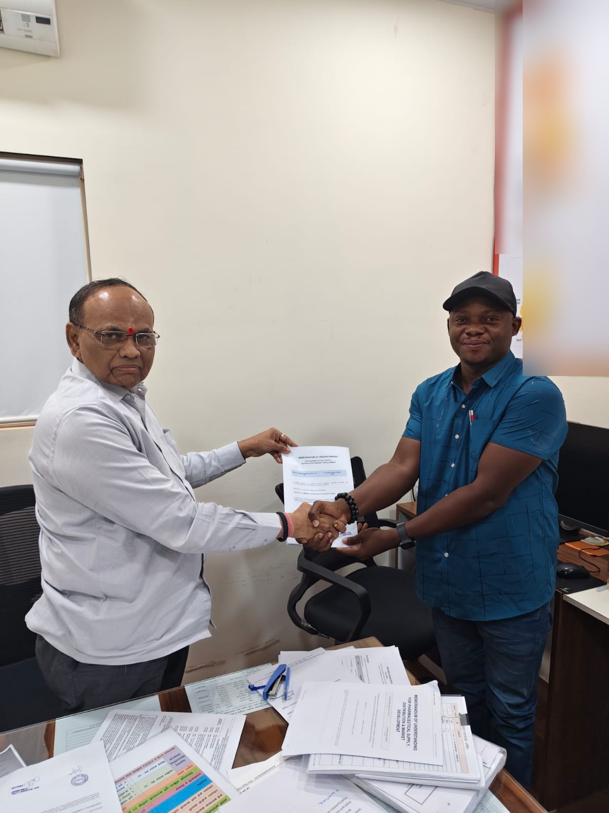 Handshake over a memorandum of understanding for pharmaceutical supply, distribution and market development